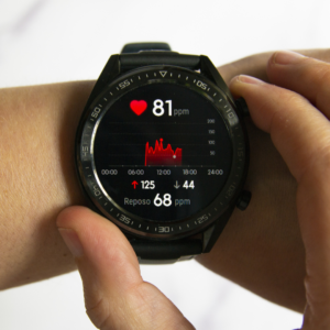 Smart running watch displaying heart rate and activity stats for personalized running training.